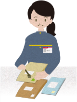 手で消印を押す